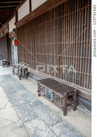 A bench in an old Japanese town 129792882