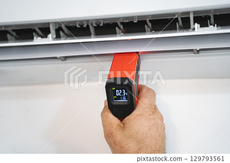 Technicians check temperature service repair and maintenance of air conditioners 129793561