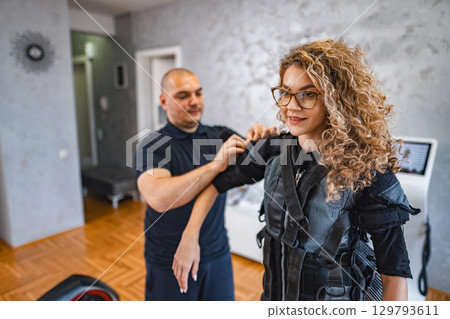 Training session with EMS technology in a modern studio 129793611
