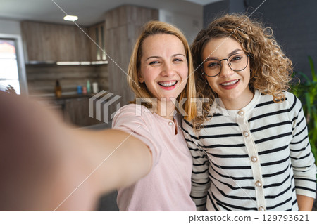 Two Women Taking a Selfie Two Women Taking a Selfie 129793621