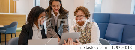 Teamwork and Collaboration in a Modern Office Setting for Enhanced Performance and Growth Teamwork and Collaboration in a Modern Office Setting for Enhanced Performance and Growth 129794018