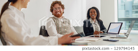 Collaboration with a diverse team is essential in todays modern office environment 129794145