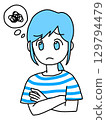 A woman with her arms crossed and worried (blue) 129794479