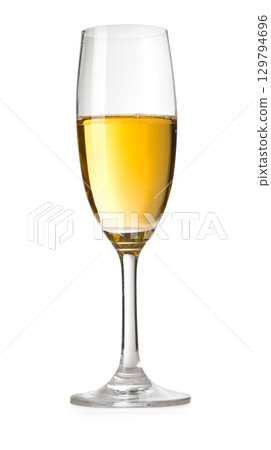 Champagne flute containing sparkling white wine on white background 129794696
