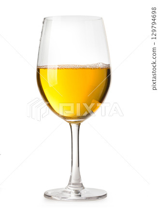 Glass of white wine standing on white background Glass of white wine standing on white background 129794698