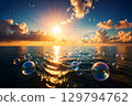 some bubbles above the sea 129794762