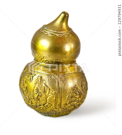 Ornate gold wu lou stands on white background representing chinese culture Ornate gold wu lou stands on white background representing chinese culture 129794931