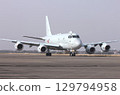 The Japan Maritime Self-Defense Force's domestically produced jet patrol aircraft P-1 taxis along the base's taxiway. 129794958