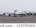 The Japan Maritime Self-Defense Force's domestically produced jet patrol aircraft P-1 taxis along the base's taxiway. 129795003