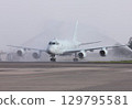 The Japan Maritime Self-Defense Force's domestically produced jet patrol aircraft P-1 takes an airplane shower after a flight to wash off any salt that has accumulated on it. 129795581