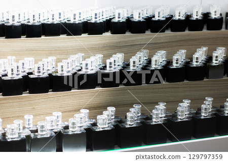 A Modern Display Featuring Lab Sample Vials Organized on Shelves 129797359