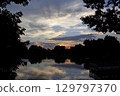 sunset over the pond sunset over the pond 129797370