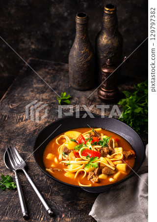 Lagman with beef and vegetables Lagman with beef and vegetables 129797382