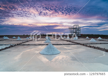 Sunset Light and Moving Clouds Over Salt Fields in Qigu, Tainan City, Taiwan. Sunset Light and Moving Clouds Over Salt Fields in Qigu, Tainan City, Taiwan. 129797665