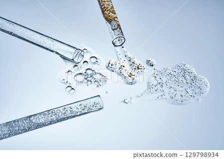 Three test tubes with spilled serums. Demonstration of textures. Three test tubes with spilled serums. Demonstration of textures. 129798934