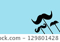 Illustration of mustache on sticks on blue background. Father's day, copy space, wedding accessories, mustache hairstyle. Men's health awareness month. Movember 129801428