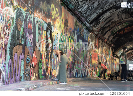 Leake Street Arches also known as the Banksy Tunnel, is a vibrant urban space known for its legal graffiti tunnel. Leake Street Arches also known as the Banksy Tunnel, is a vibrant urban space known for its legal graffiti tunnel. 129801604