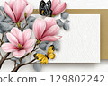 Pink magnolia flowers and butterflies framing a blank card 129802242