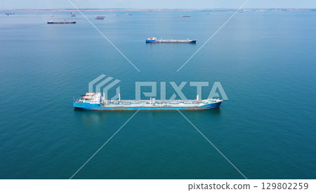 Many cargo ships waiting for port entrance 129802259