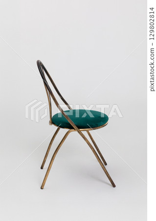 Elegant Vintage Chair featuring Green Upholstery complemented by Beautiful Gold Accents Elegant Vintage Chair featuring Green Upholstery complemented by Beautiful Gold Accents 129802814