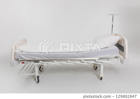 A versatile and adjustable hospital bed designed specifically for optimal patient care 129802847