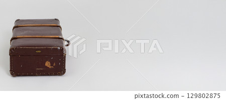 A beautifully crafted Vintage Brown Leather Travel Case featuring exquisite Brass Details A beautifully crafted Vintage Brown Leather Travel Case featuring exquisite Brass Details 129802875
