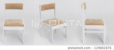 A Beautiful and Simple Wooden Chair furnished with Beige Upholstery Emphasizing Minimalist Design 129802878