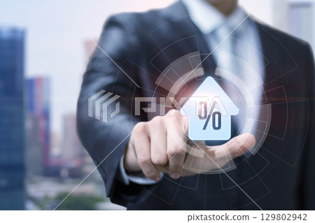 Businessman with financial percent symbol Businessman with financial percent symbol 129802942