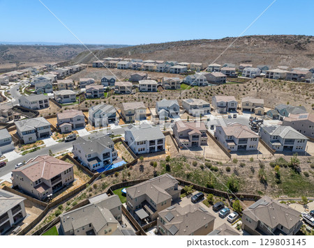 New development real estate. Aerial view of residential houses and driveways neighborhood in south San Diego, Chula Vista 129803145