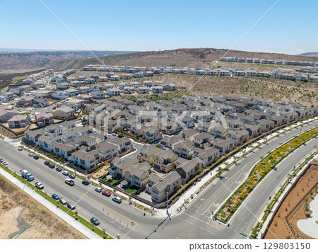 New development real estate. Aerial view of residential houses and driveways neighborhood in south San Diego, Chula Vista 129803150