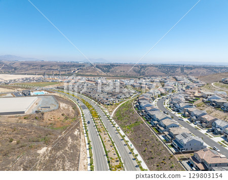 New development real estate. Aerial view of residential houses and driveways neighborhood in south San Diego, Chula Vista 129803154