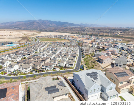 New development real estate. Aerial view of residential houses and driveways neighborhood in south San Diego, Chula Vista 129803155