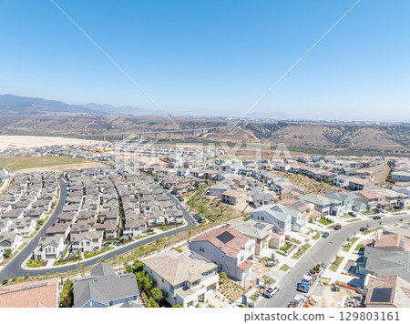 New development real estate. Aerial view of residential houses and driveways neighborhood in south San Diego, Chula Vista 129803161