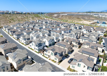 New development real estate. Aerial view of residential houses and driveways neighborhood in south San Diego, Chula Vista 129803163