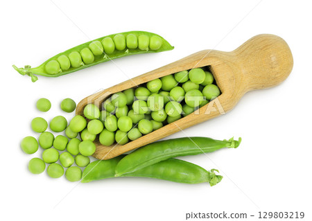 Fresh green peas in wooden scoop isolated on white background. Top view. Flat lay Fresh green peas in wooden scoop isolated on white background. Top view. Flat lay 129803219