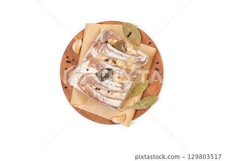 Traditional salted pork fat with spices isolated on white background 129803517