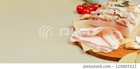 seasoned pork lard and bacon with black pepper and salt. 129803521