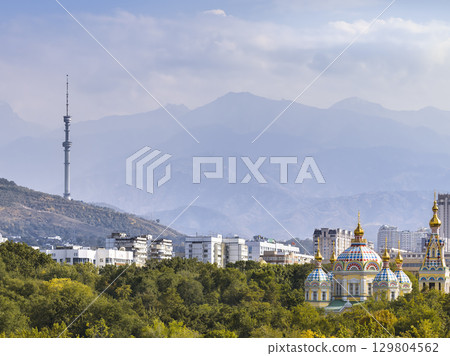Zenkov Church and Almaty Tower, view of Almaty with the Tian Shan Mountains, Almaty, Kazakhstan Zenkov Church and Almaty Tower, view of Almaty with the Tian Shan Mountains, Almaty, Kazakhstan 129804562