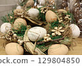Create an Elegant Easter Egg Wreath Decor to enhance your Spring Celebrations beautifully 129804850