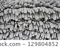 CloseUp View of an Uniquely Textured Gray Surface Showcasing Intricate Details and Patterns 129804852