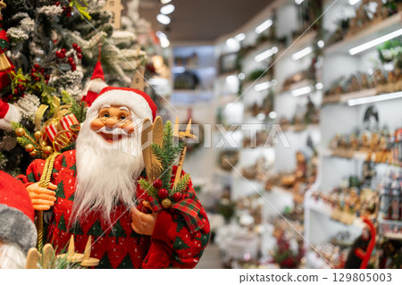 Festive Santa Claus figure in decorated Christmas Festive Santa Claus figure in decorated Christmas 129805003