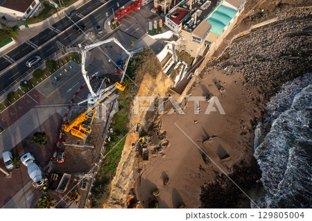 Drone view of shoreline stabilization work with Drone view of shoreline stabilization work with 129805004
