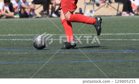 Soccer player to dribble 129805255