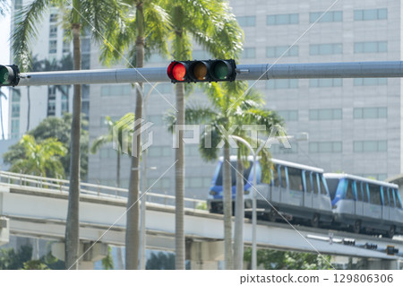 Overhead traffic lights high above street in Miami, Florida 129806306
