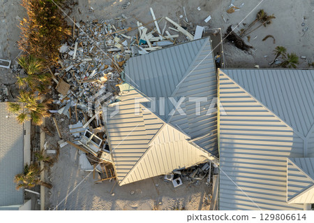 Hurricane Milton storm surge severe damage to waterfront house on Manasota Key, Florida. Destroyed home on gulf coast 129806614