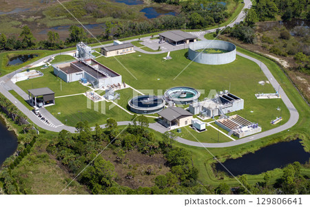 Water treatment facility with multiple tanks and filtration units. Vital infrastructure for sustainable water management and distribution Water treatment facility with multiple tanks and filtration units. Vital infrastructure for sustainable water management and distribution 129806641