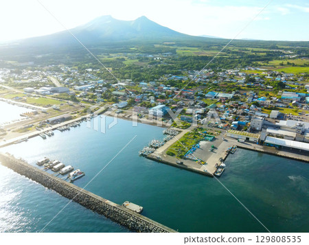 Aerial view of Mori fishing port in Mori town, Hokkaido in summer Aerial view of Mori fishing port in Mori town, Hokkaido in summer 129808535