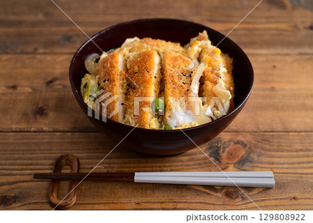 Chicken cutlet on rice Chicken cutlet on rice 129808922