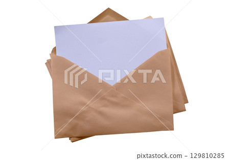 Stack of Brown craft Envelopes with Blank Paper Sheet on White Background. File with Clipping Path 129810285