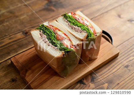 Marinated salmon and tuna sandwich Marinated salmon and tuna sandwich 129810590
